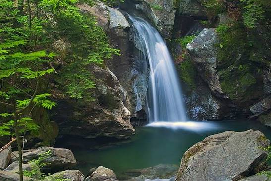 Bingham Falls deep canyon and rushing waterfall pool