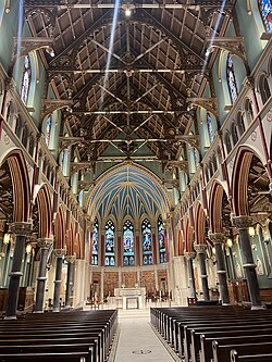 Interior of Cathedral of the Immaculate Conception Syracuse NY – grand gothic arches and stained glass