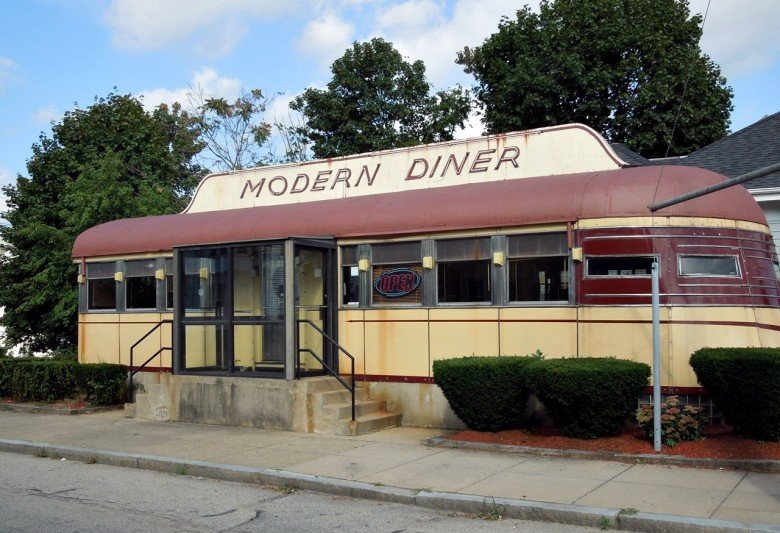Vintage classic neon neighborhood dining car serving breakfast