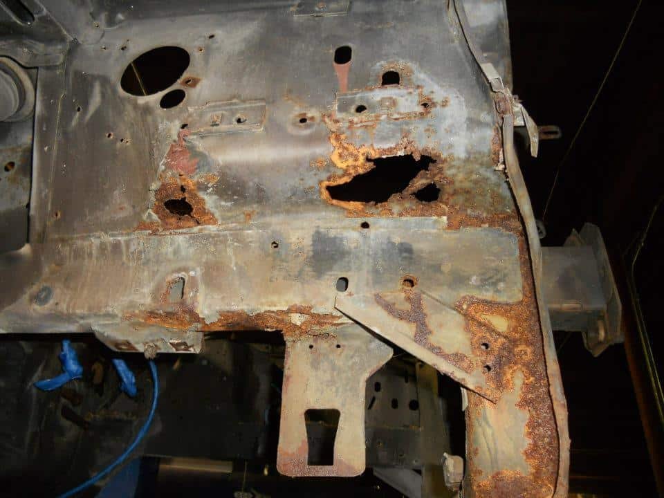 Applying active chemical oil undercoating spray to protect a truck frame