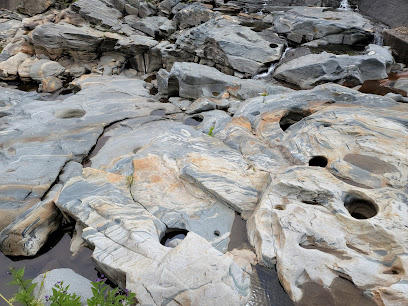 Shelburne Falls Glacial Potholes collection at river bed